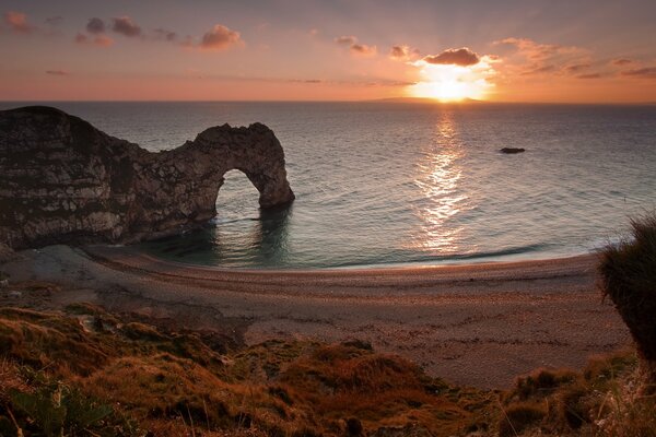 Sonnenuntergang am Sandstrand in England