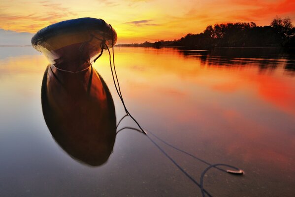 Sea. A boat. Beautiful sunset