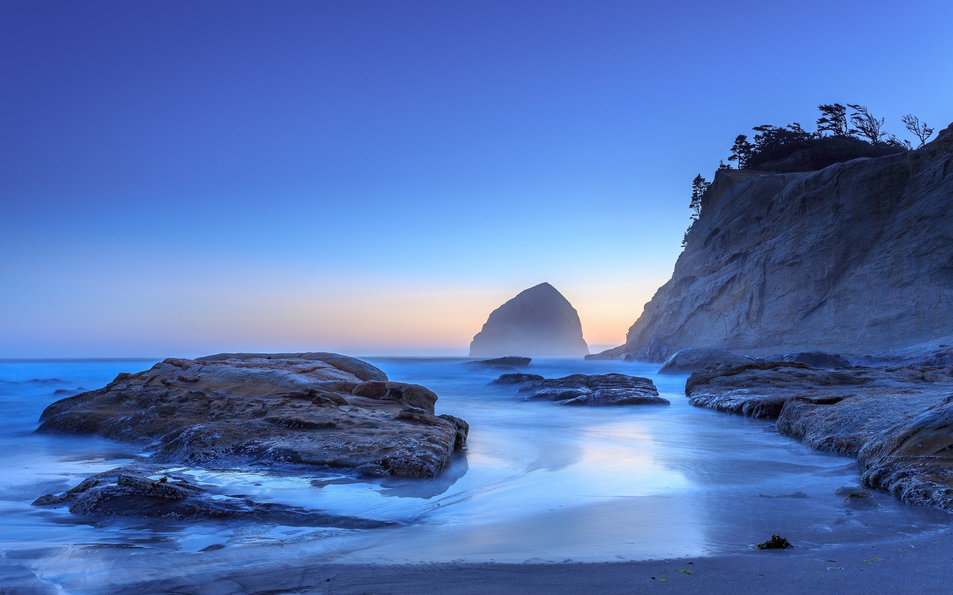 pacific city oregon usa ocean shore sand rock rocks dawn