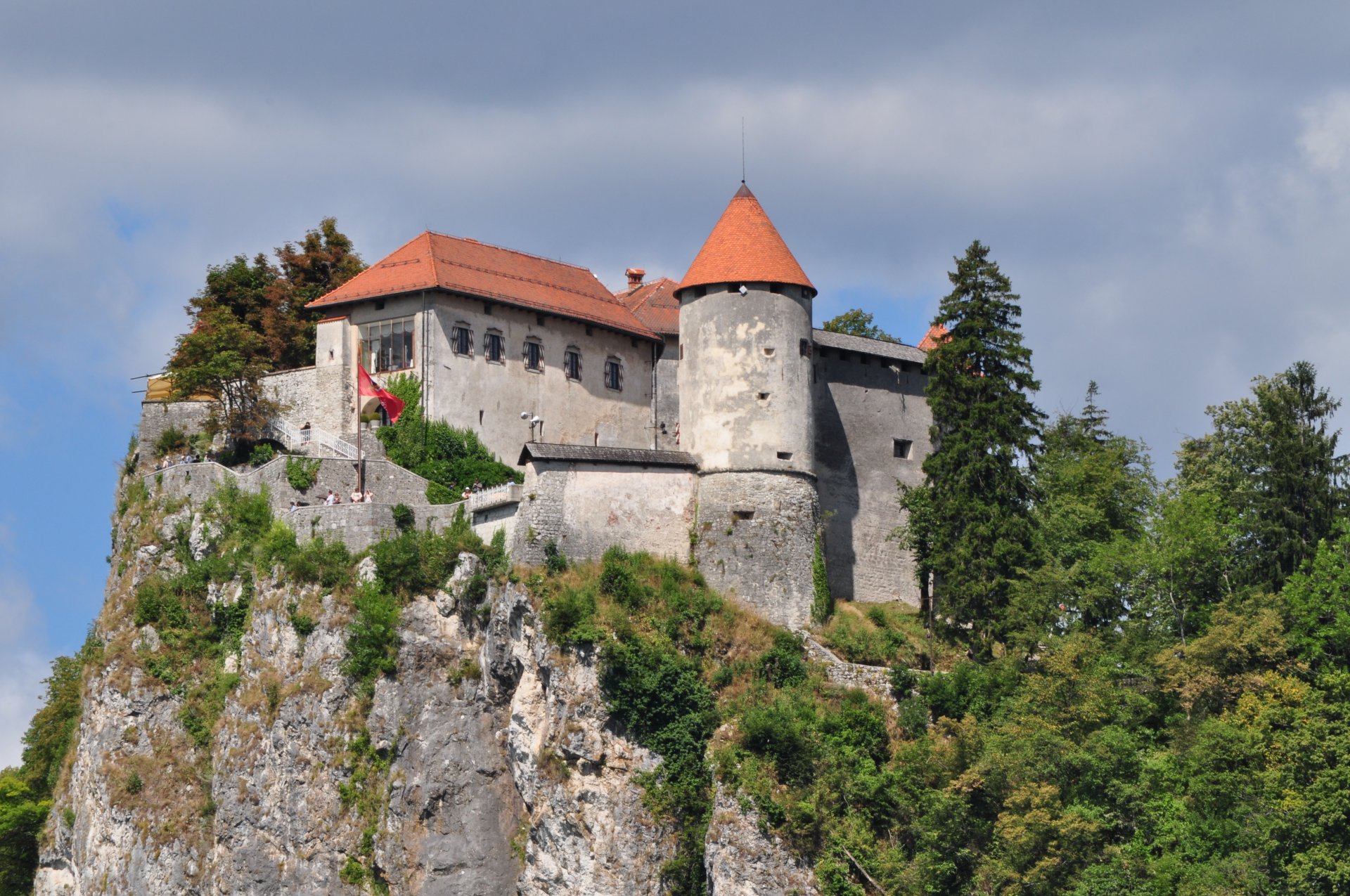 lovenia julian alps bled castle steep rock-cliff construction tree bush historical monument