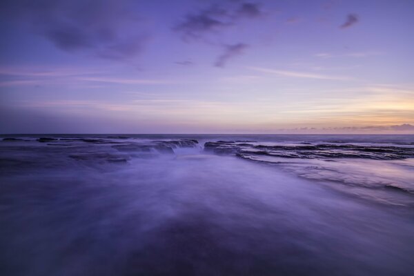 Evening lagoon with lilac sky