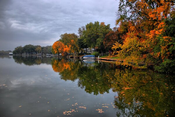 Autumn landscape lake house