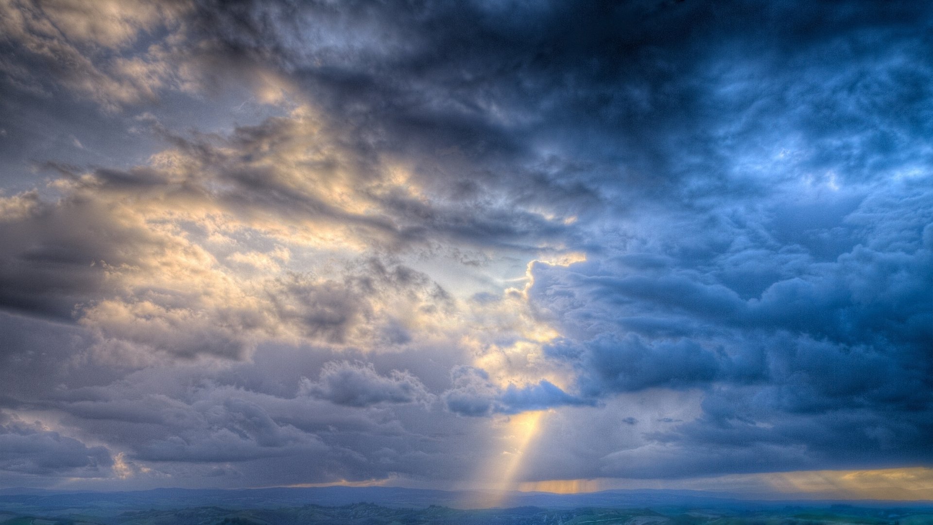 cielo nuvole luce terra raggi