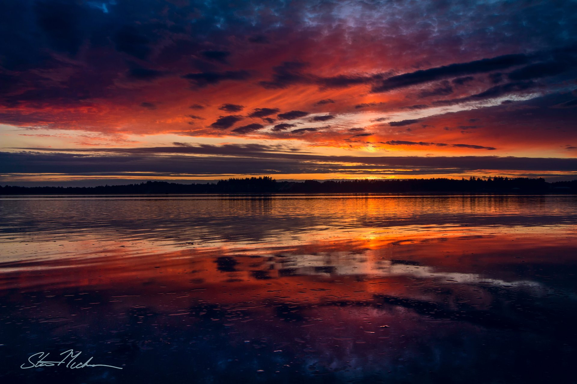 estados unidos estado oregon bahía océano pacífico río cus tarde puesta del sol reflexiones cielo agua nubes