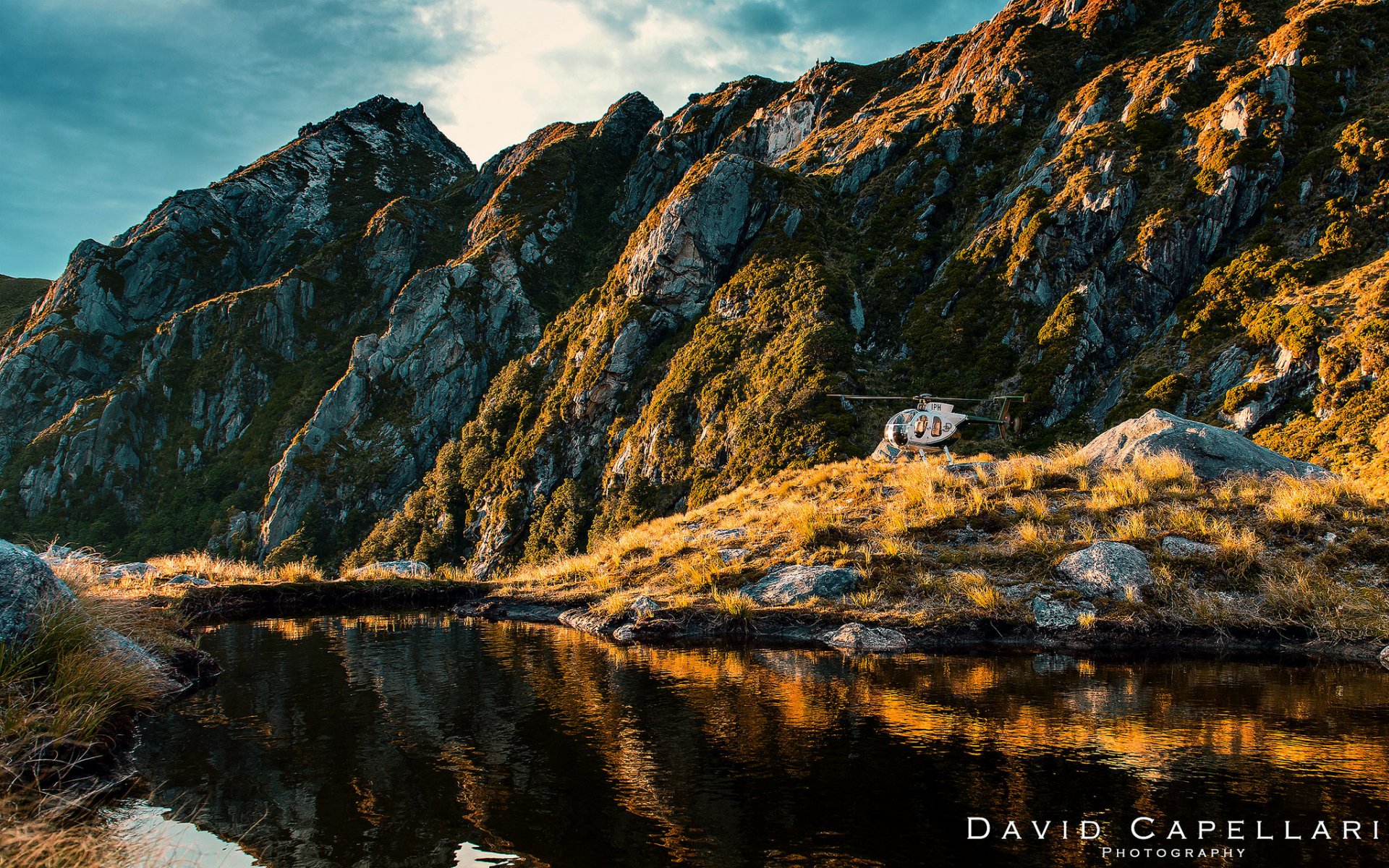 neuseeland david capellar see berge natur felsen hubschrauber