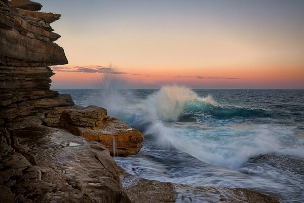 Sunset sea spray waves