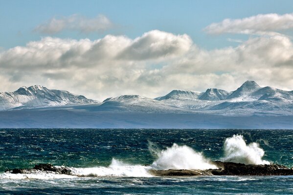 Landscape of the sea bay at the foot of the mountains