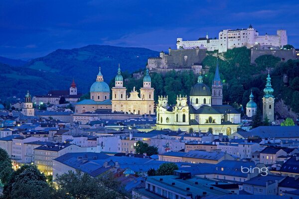 Evening city in lights. Cathedral in Salzburg