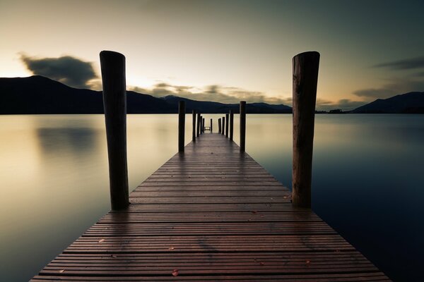 Photo of a lake with a pier