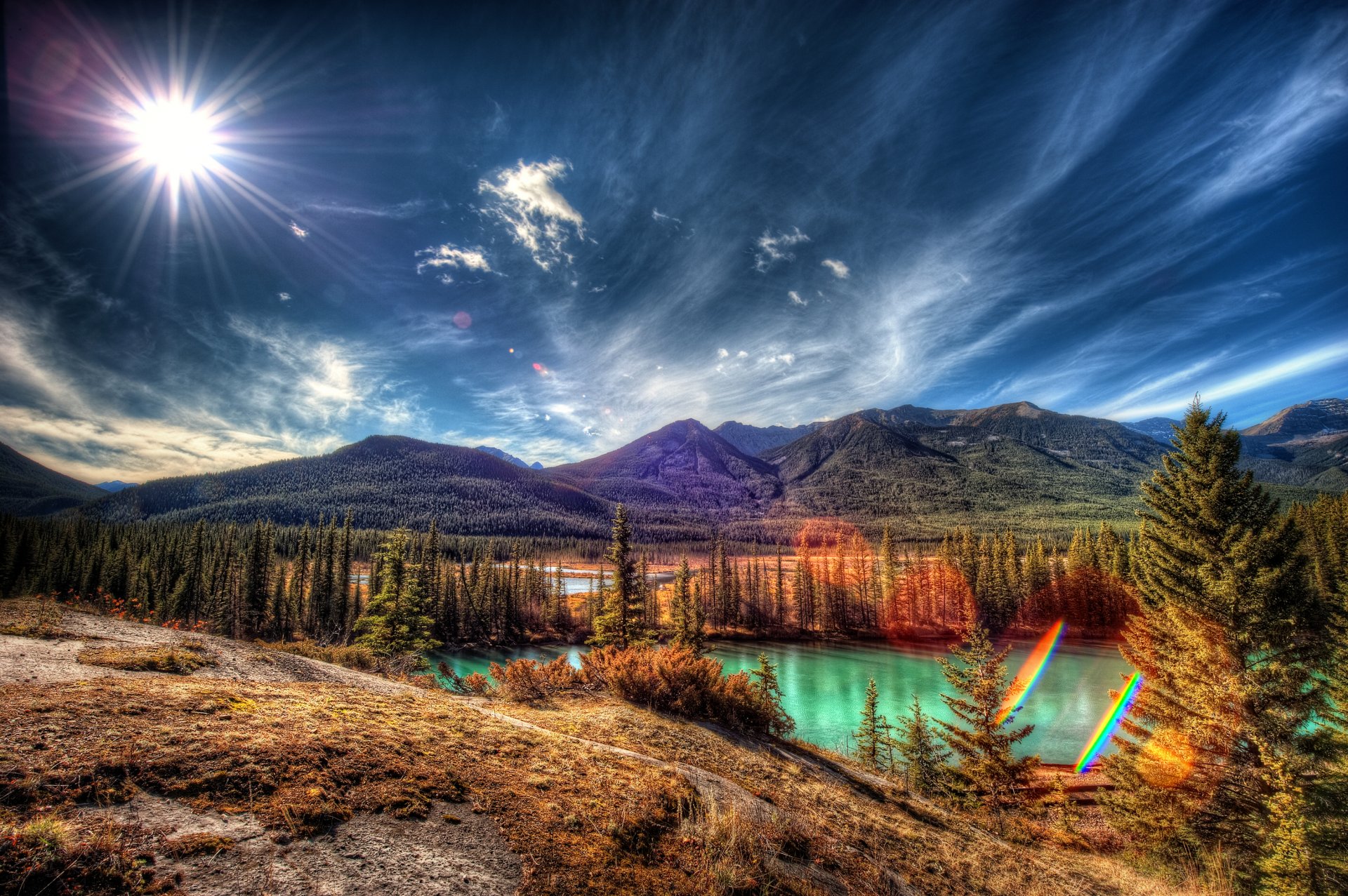 banff national park alberta canada sky clouds sun rays mountain tree lake highlight