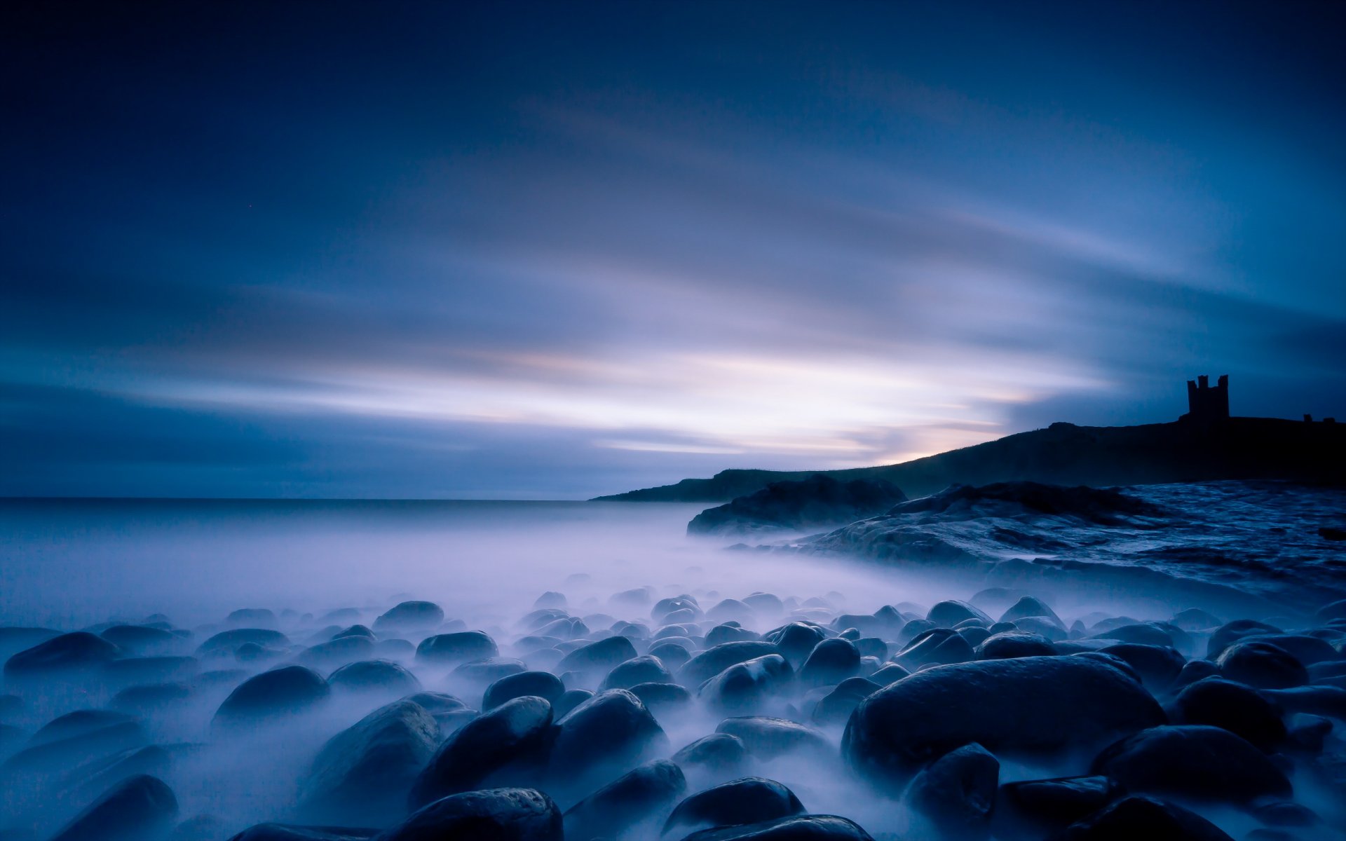 mar rocas paisaje noche