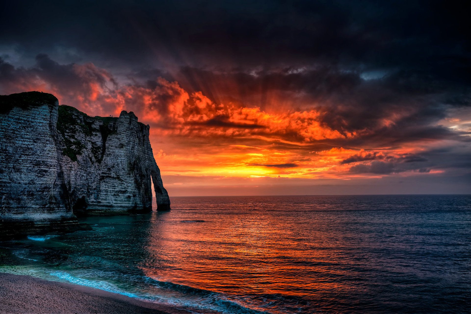 etretat france sea normandy rock sun sunset rays clouds landscape