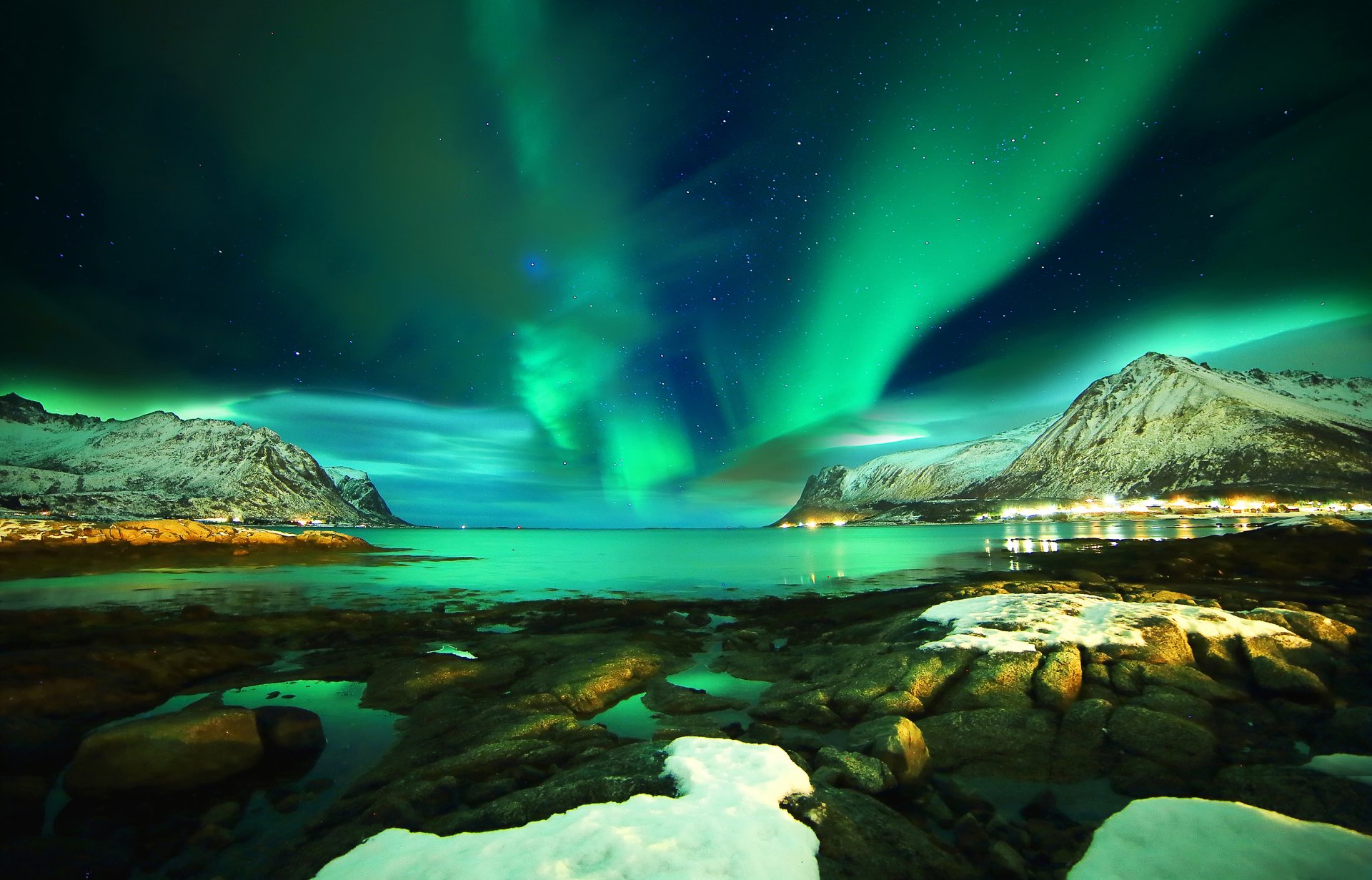 lofoten islands norway lofoten northern lights mountain sea stones snow night star