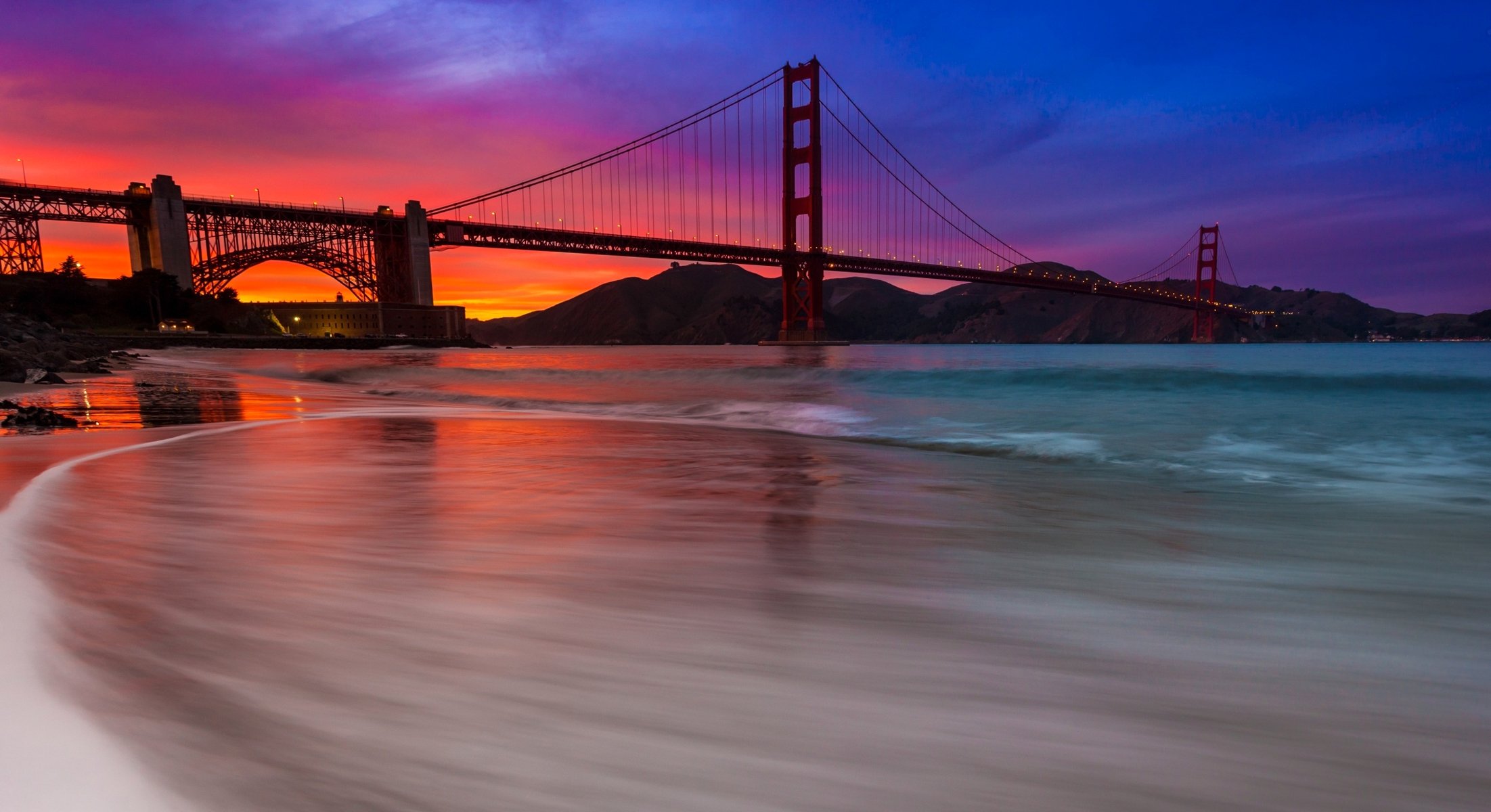 estados unidos san francisco puente golden gate cielo nubes puesta de sol resplandor montañas bahía