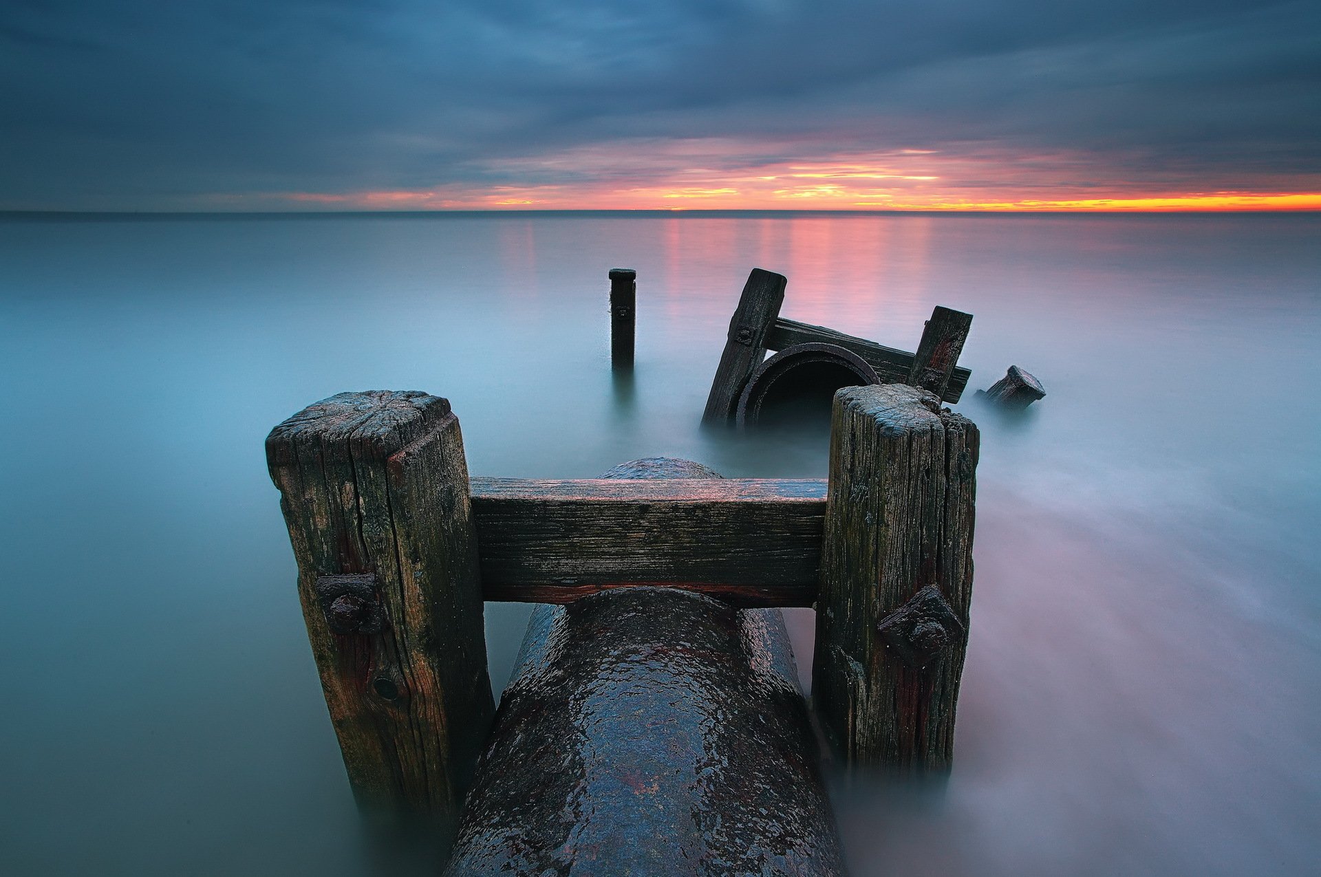 tramonto mare pilastri paesaggio