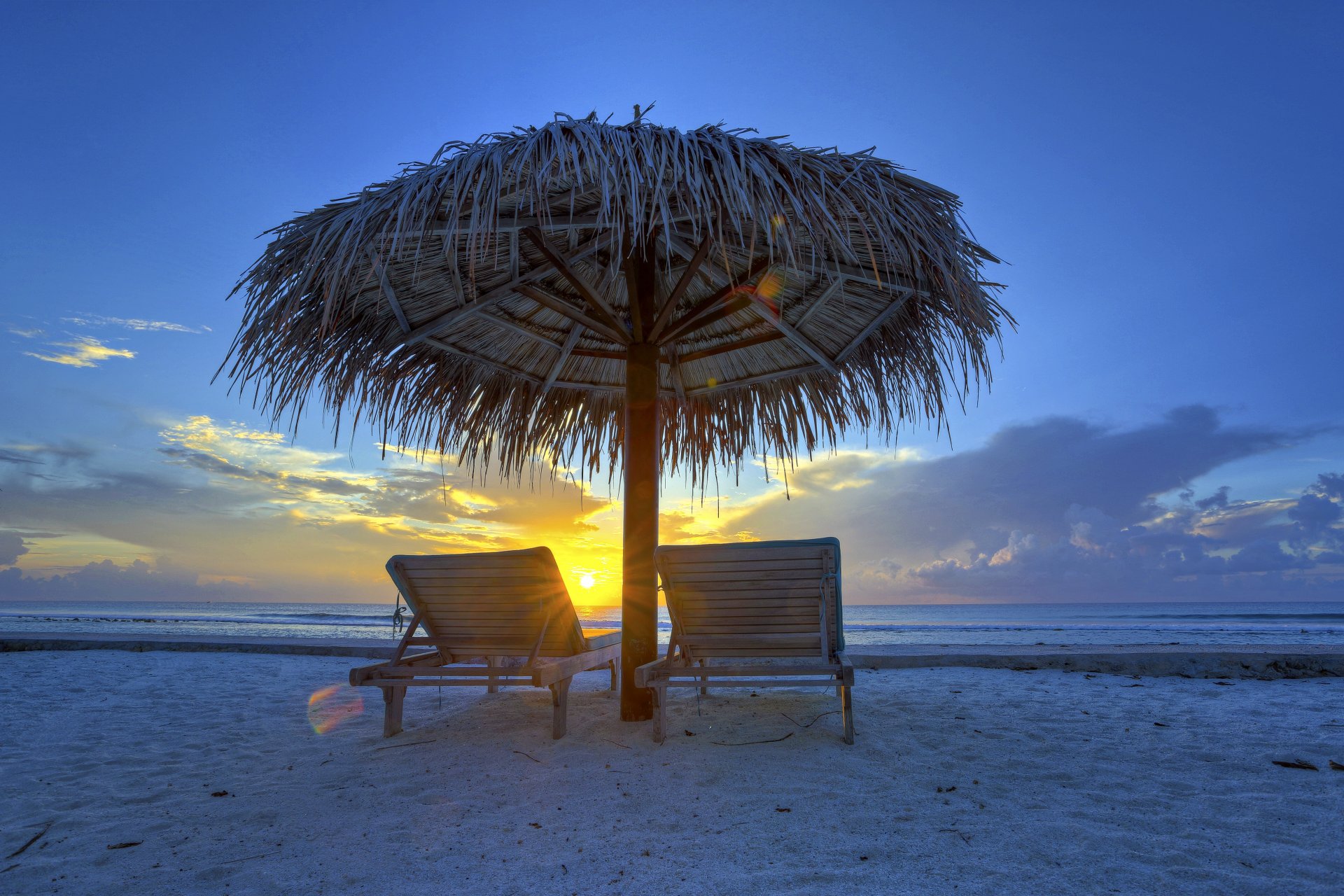 night sky the maldives sea sunset clouds chaise shed umbrella