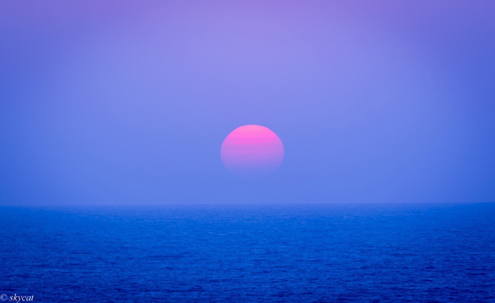 giappone oceano sera tramonto sole lilla cielo orizzonte