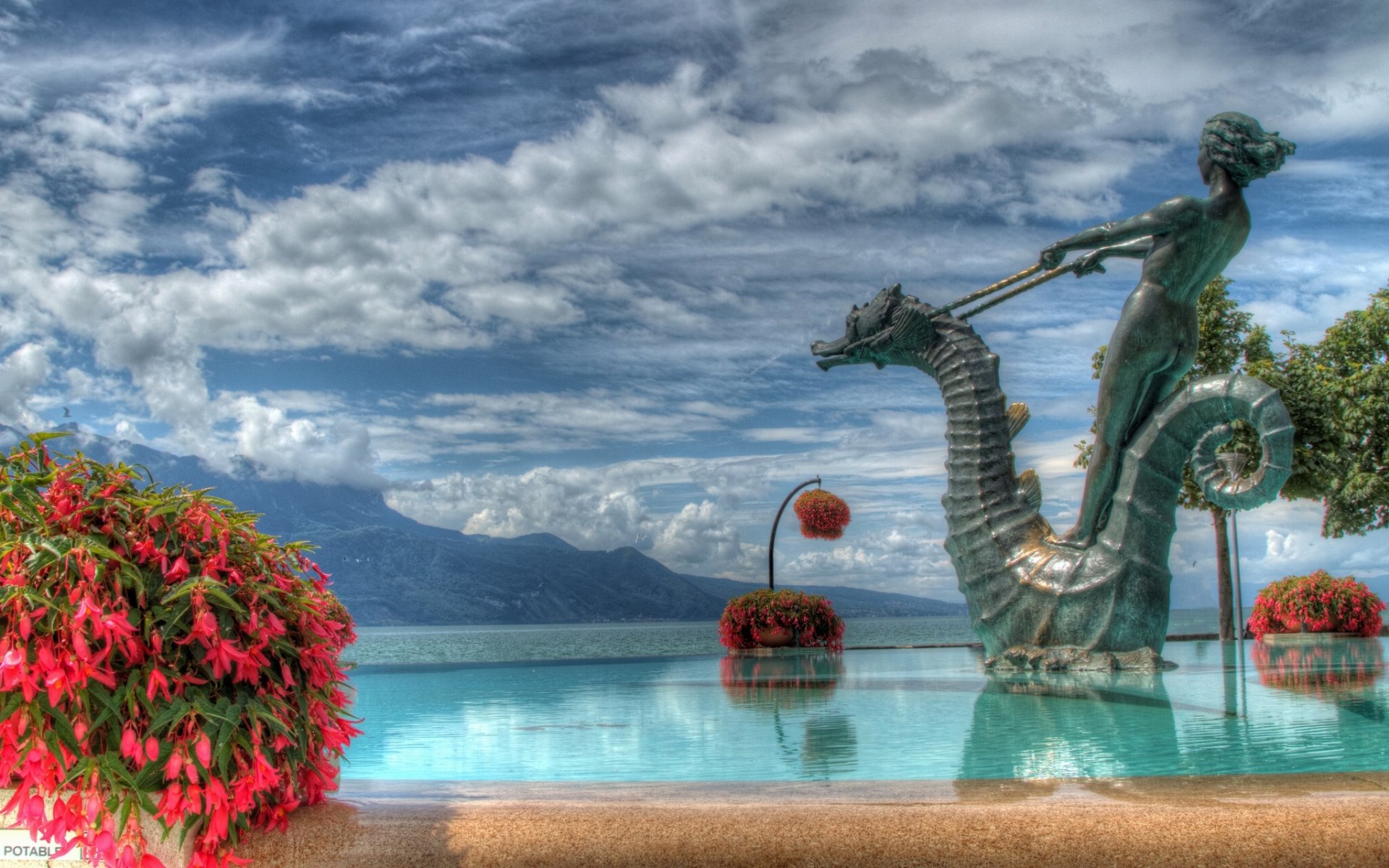 vevey suiza lago de ginebra flores fuente escultura paisaje