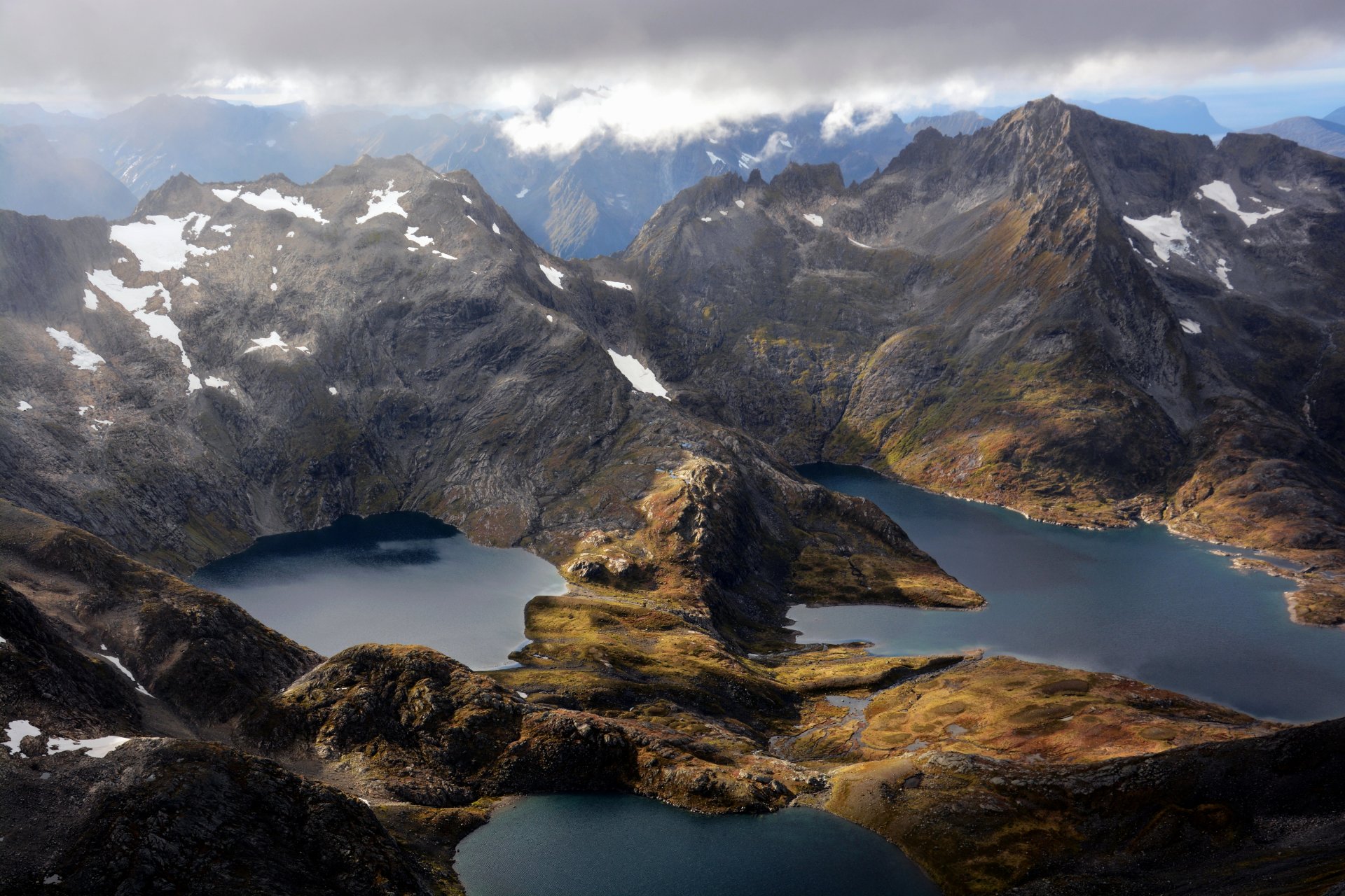 lakes mountains snow clouds straumgjerde norway