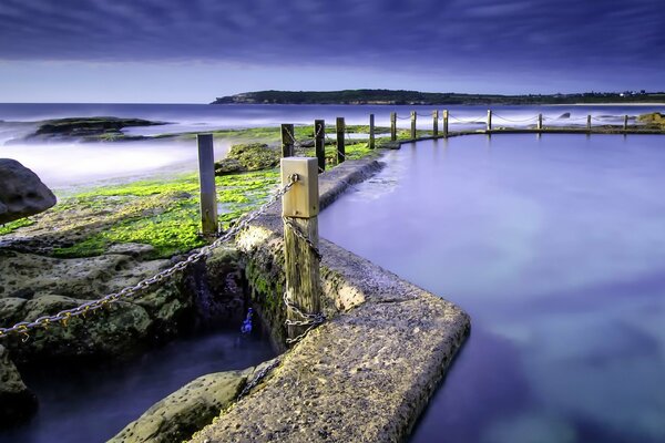 Sea water with a fence