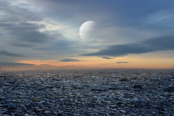 Paysage fantastique avec des pierres et une planète