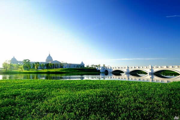 Bridge with arches on the background of the river