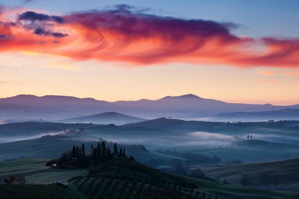 Dawn in Italy. Morning fields