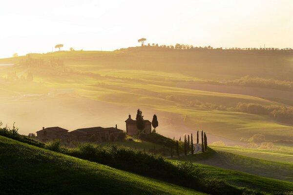 Italy. Foggy dawn in Tuscany