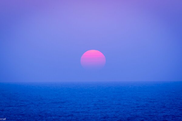 The ocean off the coast of Japan against the background of a lilac sky