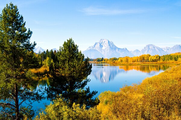 A national park in the USA. Autumn forest with lake