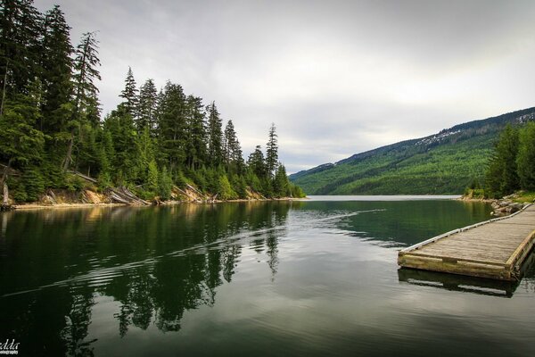 A river in Canada and a wooden pier