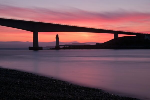 Lighthouse in Scotland UK in calm at sea